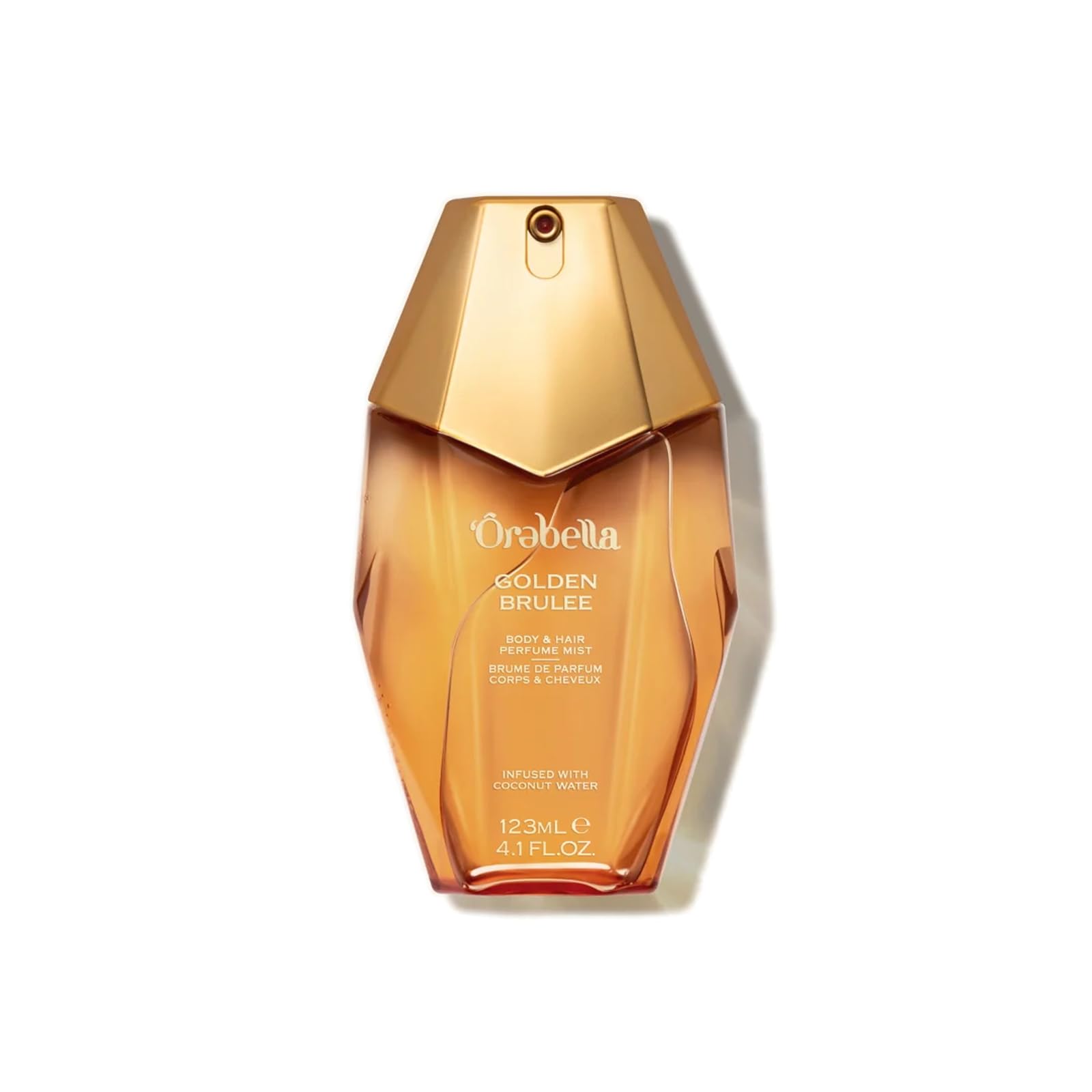 Orebella Golden Brulee Hair & Body Perfume Mist | Alcohol-Free, 123 ml | An amber gourmand fragrance mist with notes of plum, tonka bean and vanilla. Coconut water hydrates and softens the skin