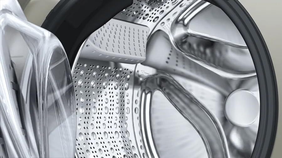 ภายใน view of the washing machine drum, showing its textured surface