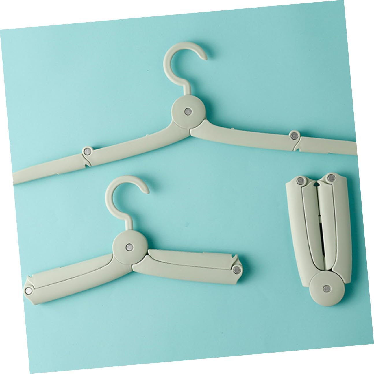 Toyvian 6 pezzi Grucce da Viaggio Pieghevoli in Leggero Verde Appendiabiti Portatile Compatto con Pinze per Casa Campeggio e Organizzazione Armadio