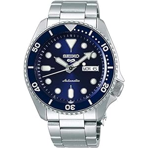 SEIKO Reloj automático para hombre – 5 deportes – calendario día/fecha, agujas y marcadores LumiBrite y bisel giratorio, 328.1 ft resistente al agua
