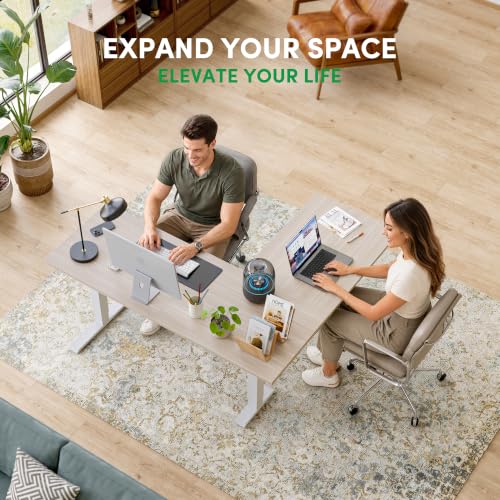 Image of FEZIBO 63 inch x 55 inchL Shaped Standing Desk Adjustable Height, Electric Stand up Corner Computer Desk, Sit Stand Home Office Desk with Splice Board, Light Walnut