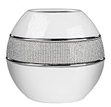 Aufwendig hergestellt besteht diese Vase aus Keramik in der Farbe weiß und silber. Die Blumenvase besteht aus glänzenden Elementen, verziert mit Strass Steinen was der Vase seinen besonderen Charme verleiht. Die Vase hat eine Gesamthöhe von 15 cm.