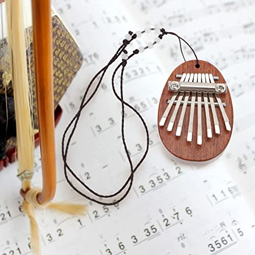 BIENKA Mini Thumb Piano 8 Touches Kalimba Finger Piano avec Corde Suspendue Mini Kalimba avec Cordon Chaîne Mbira Main… - Les Beatles, Paul McCartney, John Lennon, RIngo Starr, George Harrison BIENKA Mini Thumb Piano 8 Touches Kalimba Finger Piano avec Corde Suspendue Mini Kalimba avec Cordon Chaîne Mbira Main… – Image 6