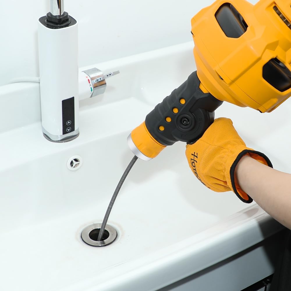 Person using the Hoteche Electric Pipe Cleaning Spiral to clear a sink drain