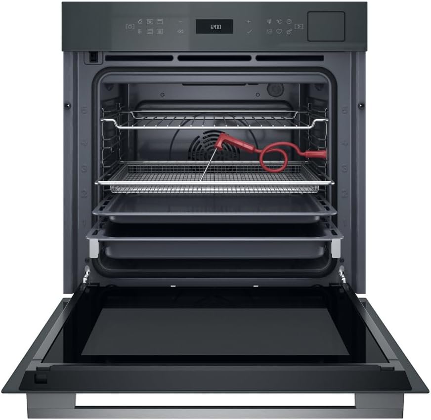 ינלענדיש view of the Whirlpool WOI7A8FPT1SSGA oven with door open, showing multiple racks, a grill pan, and a red temperature probe.