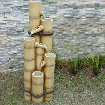 Direct Global Trading Oriental Bamboo Poles Water Feature Solar Powered With Battery Back Up Amazon Co Uk Garden Outdoors