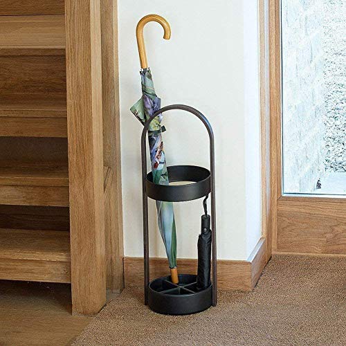 Seau de parapluie créatif en fer pour un hall d'hôtel toujours sec