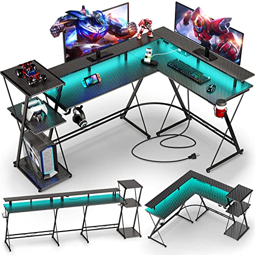 SEVEN WARRIOR L Shaped Gaming Desk with LED Lights & Power Outlets, 58”Reversible Computer Desk with Storage Shelf & Monitor Stand, Corner Desk with Cup Holder, Gaming Table with Headphone Hook, Black