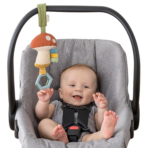 Image of Itzy Ritzy Jingle Travel Toy for Stroller, Car Seat or Activity Gym - Baby Hanging Toy Features Jingle Sound, Clinking Rings & Adjustable Attachment Loop (Mushroom)