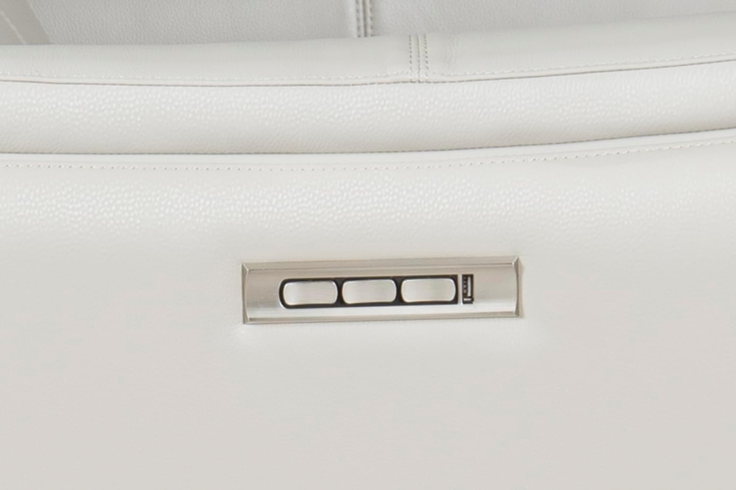 Close-up of the recliner's control panel with buttons and a USB port