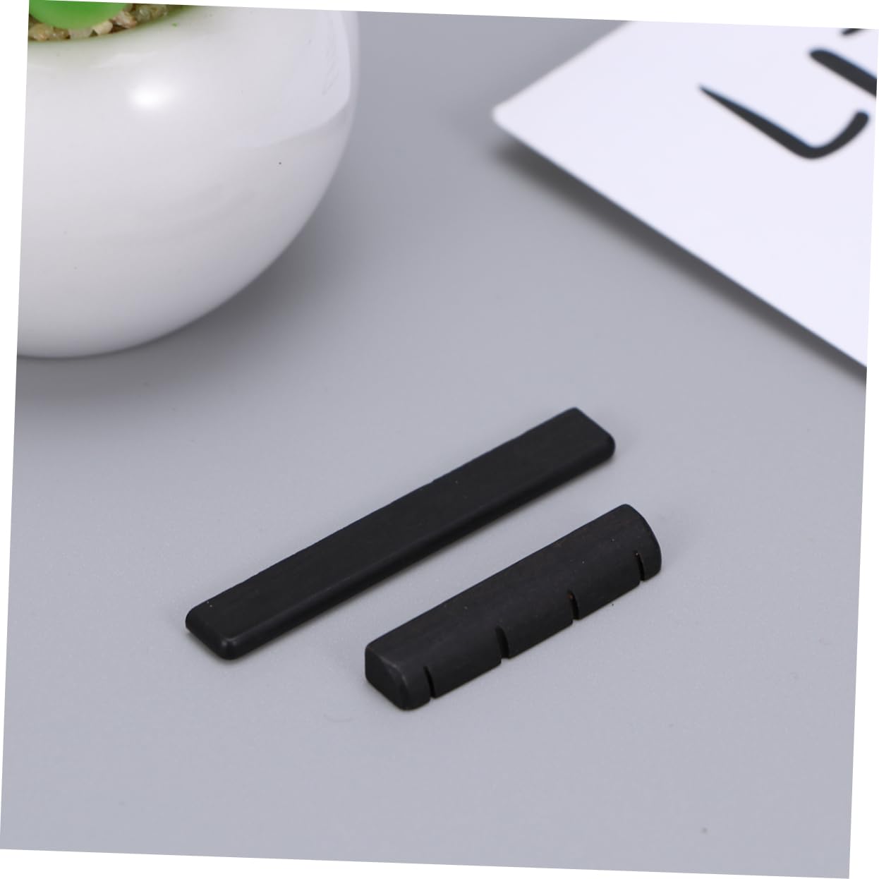 CIMAXIC Guitar Nut and Saddle Set Ebony 4-string for Ukulele Easy to Cut to Fit Improve Playability and Sound