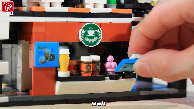 TYCOLE City Coffee Shop - Juego de bloques de construcción, 581 piezas de modelo de arquitectura con luces para exhibición y decoración, juguete de café realista, regalo de Navidad/cumpleaños para