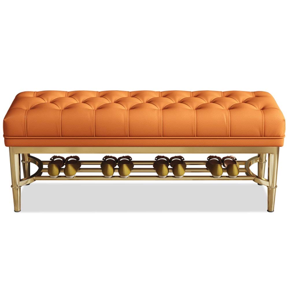 Banc de lit orange avec étagère à chaussures en métal pour une chambre moderne