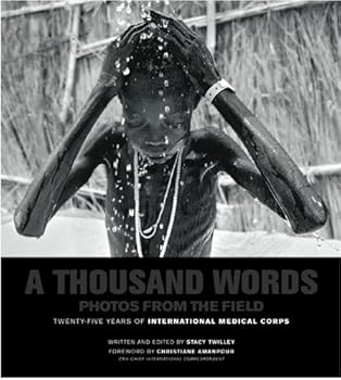 Hardcover A Thousand Words: Photos From the Field (25 Years of International Medical Corps) Book