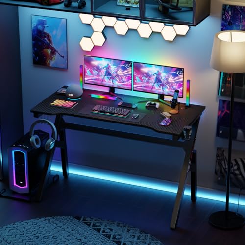 Image of BestOffice | 47 inch Gaming Desk | Black & Red | Carbon Fiber Textured Computer Desk | Sturdy Steel Frame,Cup Holder, Headphone Hook, Cable Management Holes, Adjustable Leg Pads | for Gamers,Home,Office