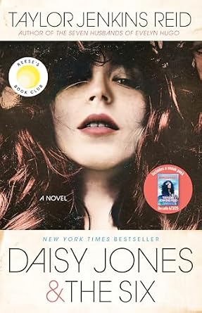 Daisy Jones & The Six by Taylor Jenkins Reid, depicting a woman with brown hair looking down at the viewer with her mouth slightly open.