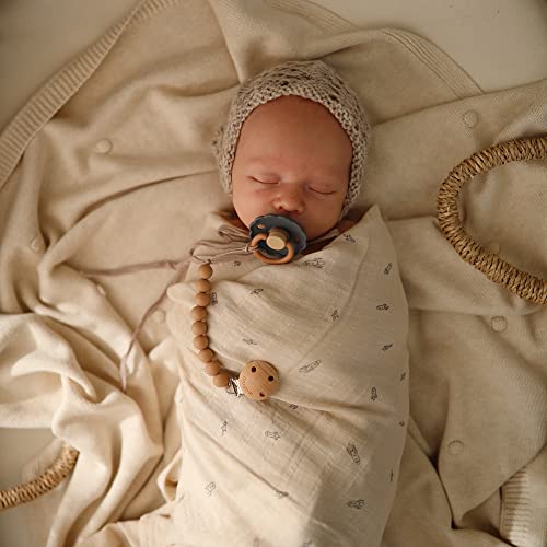 Image of mushie Muslin Baby Swaddle Blanket | 100% Organic Cotton (Rocket Ship)