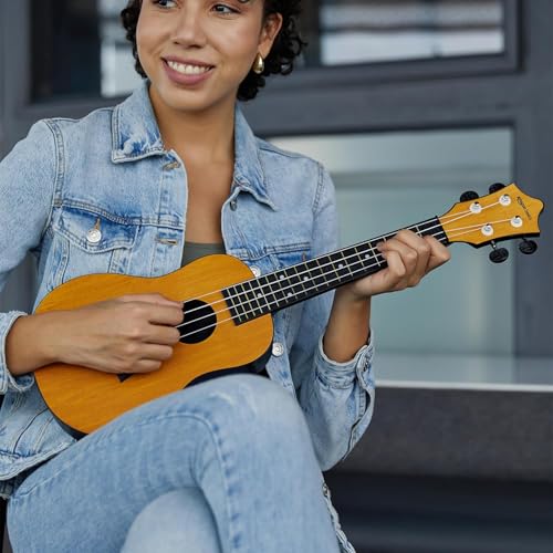 Image of Amazon Basics Concert Size Ukulele Kit, Nylon Strings for warm, mellow and bright tones | Basswood Body | ABS back | Matte Finish, with Bag, Picks, Strap - Natural Brown