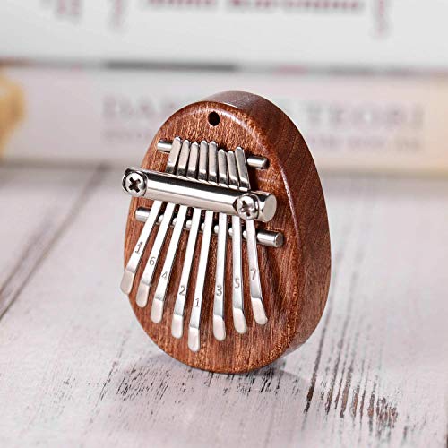 gotyou Kalimba 8 Clés Pouce Piano, Kalimba Portable, piano à pouce avec cordon, Kalimba Partition, Mini Portable Piano à… - Les Beatles, Paul McCartney, John Lennon, RIngo Starr, George Harrison gotyou Kalimba 8 Clés Pouce Piano, Kalimba Portable, piano à pouce avec cordon, Kalimba Partition, Mini Portable Piano à… – Image 5