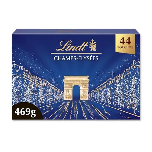 Lindt - Boîte CHAMPS-ÉLYSÉES Assorti - Assortiment de Chocolats au Lait, Noirs et Blancs - Pralinés, Croustillants et Onctueux - Idéal pour Noël, 469g