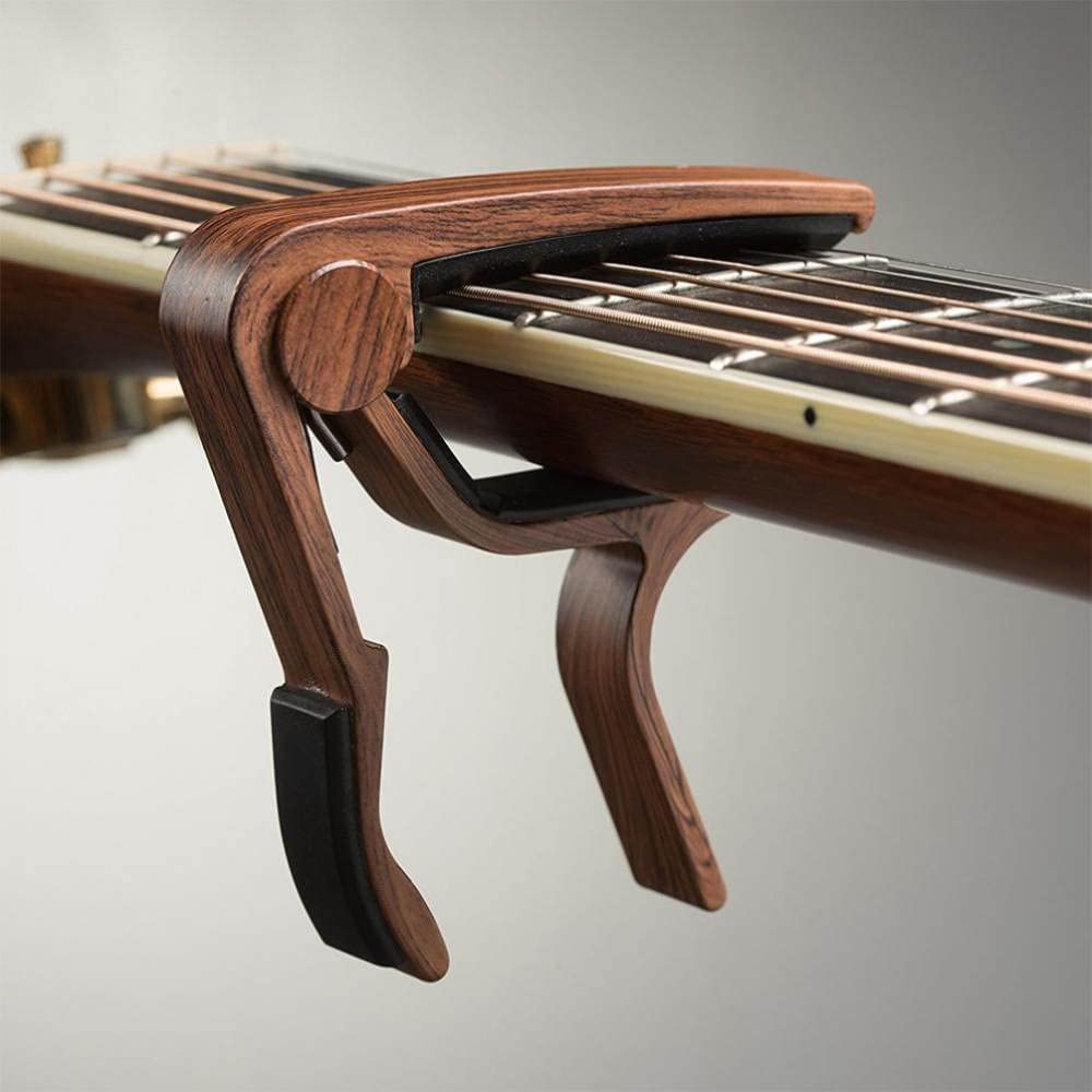 Certificazione di sicurezza Certificazione di sicurezza Accessori for strumenti musicali Capotasto for chitarra in metallo con venature del legno, con clip in tono Guitarra for cuscino in silicone per
