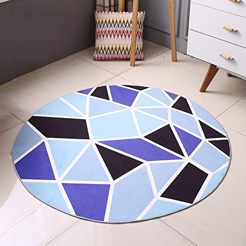Tapis géométrique bleu pour salon et chambre créant un coin lecture cosy