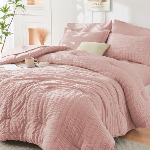 Image of HYMOKEGE Rose Gold Oversized King Comforter Set Seersucker 7 Pieces, All Season Luxury Bed in a Bag for Bedroom, Bedding Set with Comforter, Sheets, Pillowcases & Shams