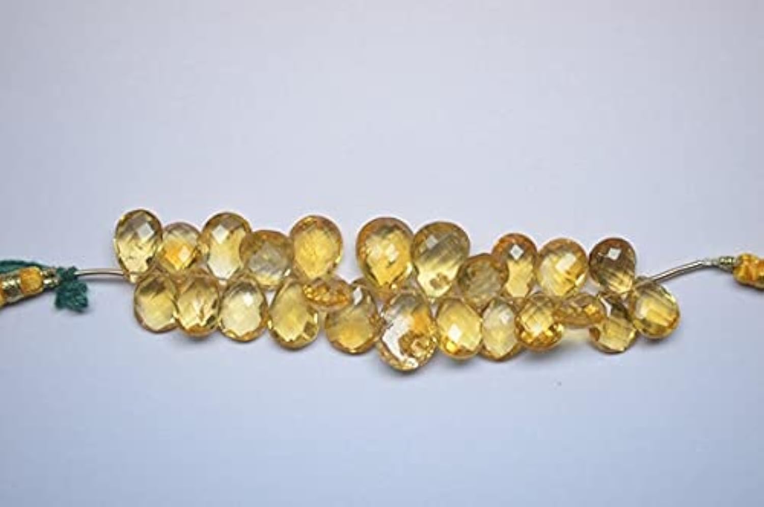 Citrine naturelle poire facettée pour créer un bijou d'anniversaire personnalisé