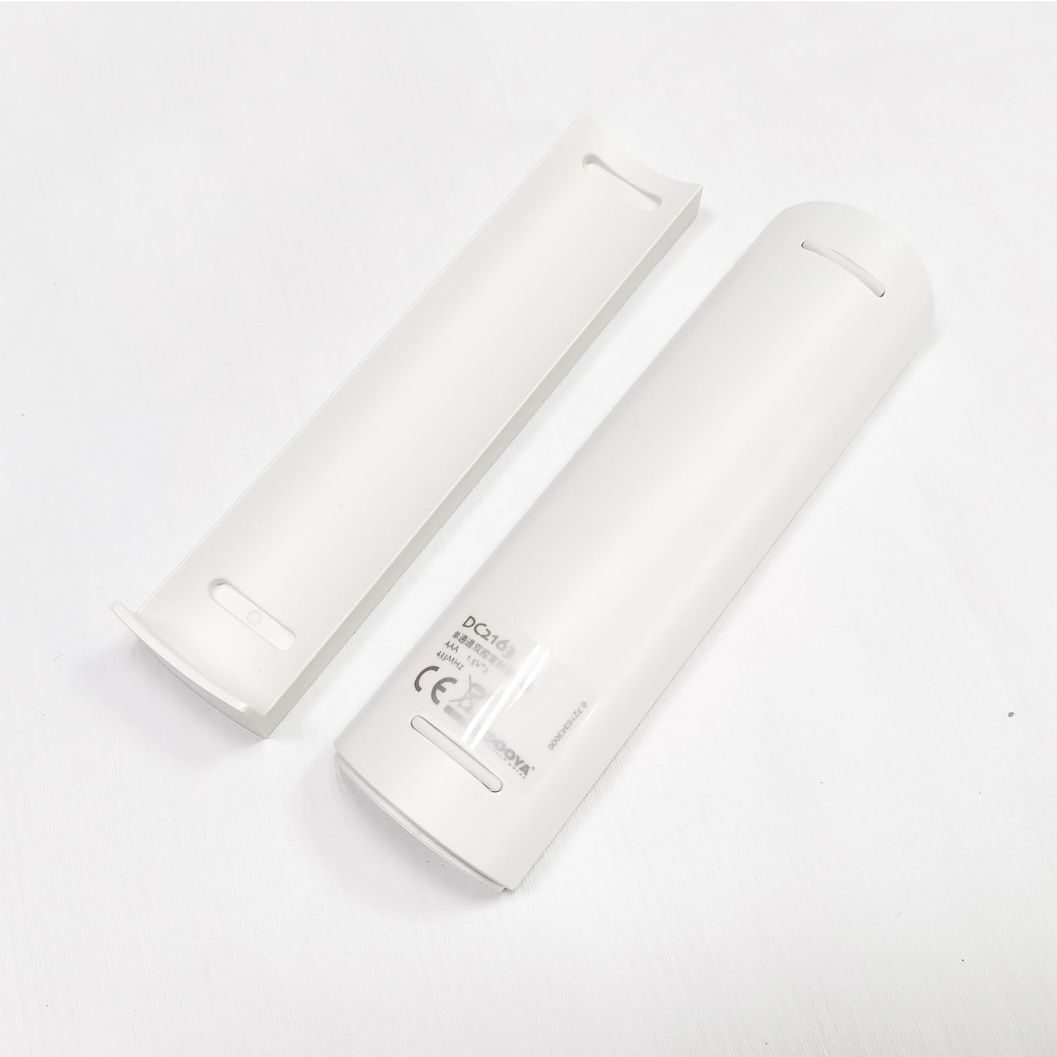 Back view of Dooya DC2163 Remote Control showing model and battery information