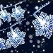 Produktbild Qxmcov Weihnachten Schneeflocke Lichterketten, 8 Meter 50 LED Lichterkette mit Fernbedienung 8 Blinkmodi, Beleuchtung Stimmungslichter für Weihnachten Hochzeit Geburtstag Party Dekoration Innen Außen