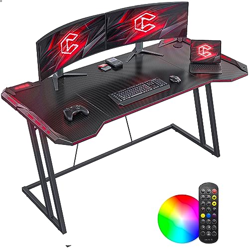 CubiCubi Gaming Schreibtisch, 140 x 60 cm Esport Ergonomischer Computertisch Tisch mit Kohlefaseroberfläche und LED, stabiles Z-Gestell, Kopfhörerhaken zum Spielen, Lernen, Schwarz