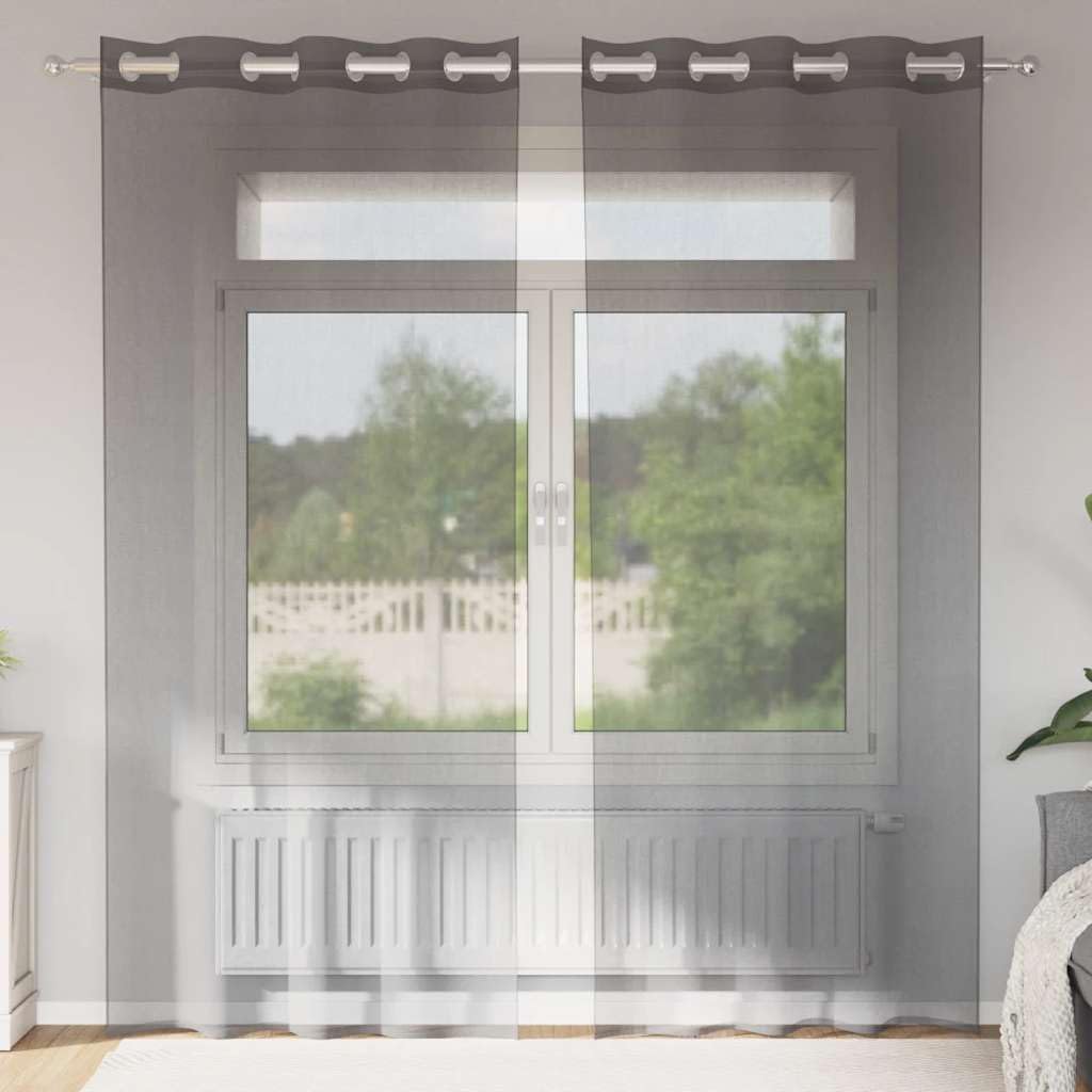Voilage gris foncé à œillets pour créer une ambiance moderne dans votre salon