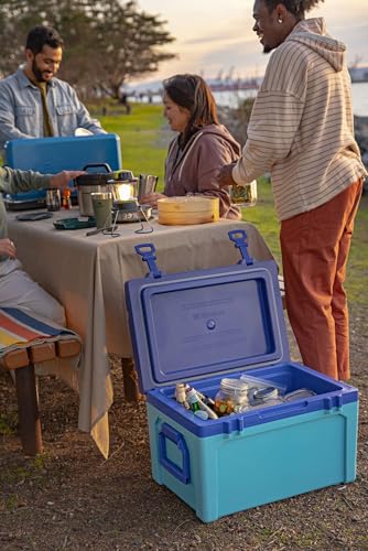 Image of Stanley Adventure Outdoor Cooler 50 qt | Heavy Duty Outdoor Camping Cooler with Easy Carry Side Handles | 6 Days Cooling Ice Chest for 82 Cans | Flat Top Doubles as Seat | BPA-Free | Black 2.0
