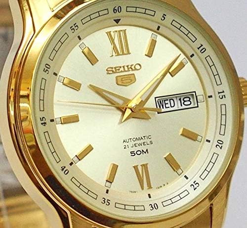 Angled close-up of the SEIKO 5 Automatic Watch SNKP20K1S dial, showing the 'SEIKO 5' logo, 'AUTOMATIC 21 JEWELS 50M' text, and the day/date display.