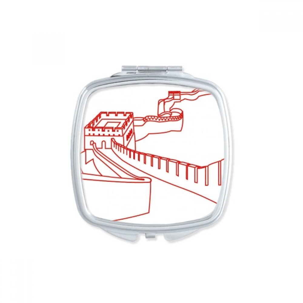 Miroir de poche à la main multicolore pour vos retouches en voyage