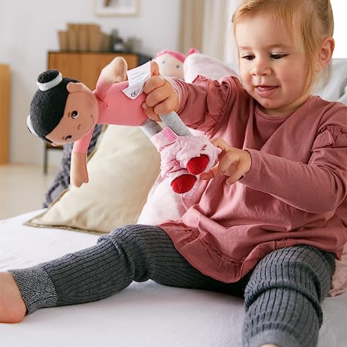 Image of HABA Snug Up Doll Rumbi - 10 inch Soft Doll with Black Hair and Pink Overalls - Machine Washable for 18 Months and Up