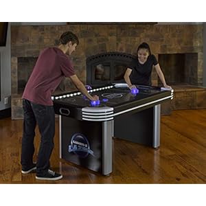 Triumph Sports Lumen-X Lazer 6' Interactive Air Hockey Table Featuring All-Rail LED Lighting and In-Game Music Triumph Sports Lumen X Lazer 6 Interactive Air Hockey Table Featuring All Rail LED Lighting and In Game Music