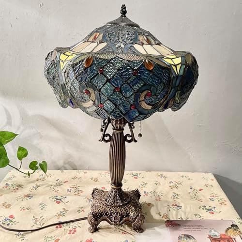 Alt Text for image 3: Bieye Baroque Table Lamp illuminating a cosy living room corner