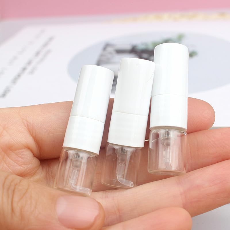 Atomizador de perfume 20/50/100 piezas 1 ml spray de perfume de vidrio portátil botella recargable dispensador de muestras de bombeo directo prensa de pulverización fina botellas vacías recargables