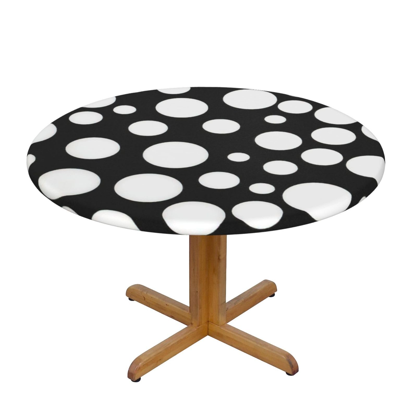 Nappe ronde à pois au design graphique intemporel pour salle à manger