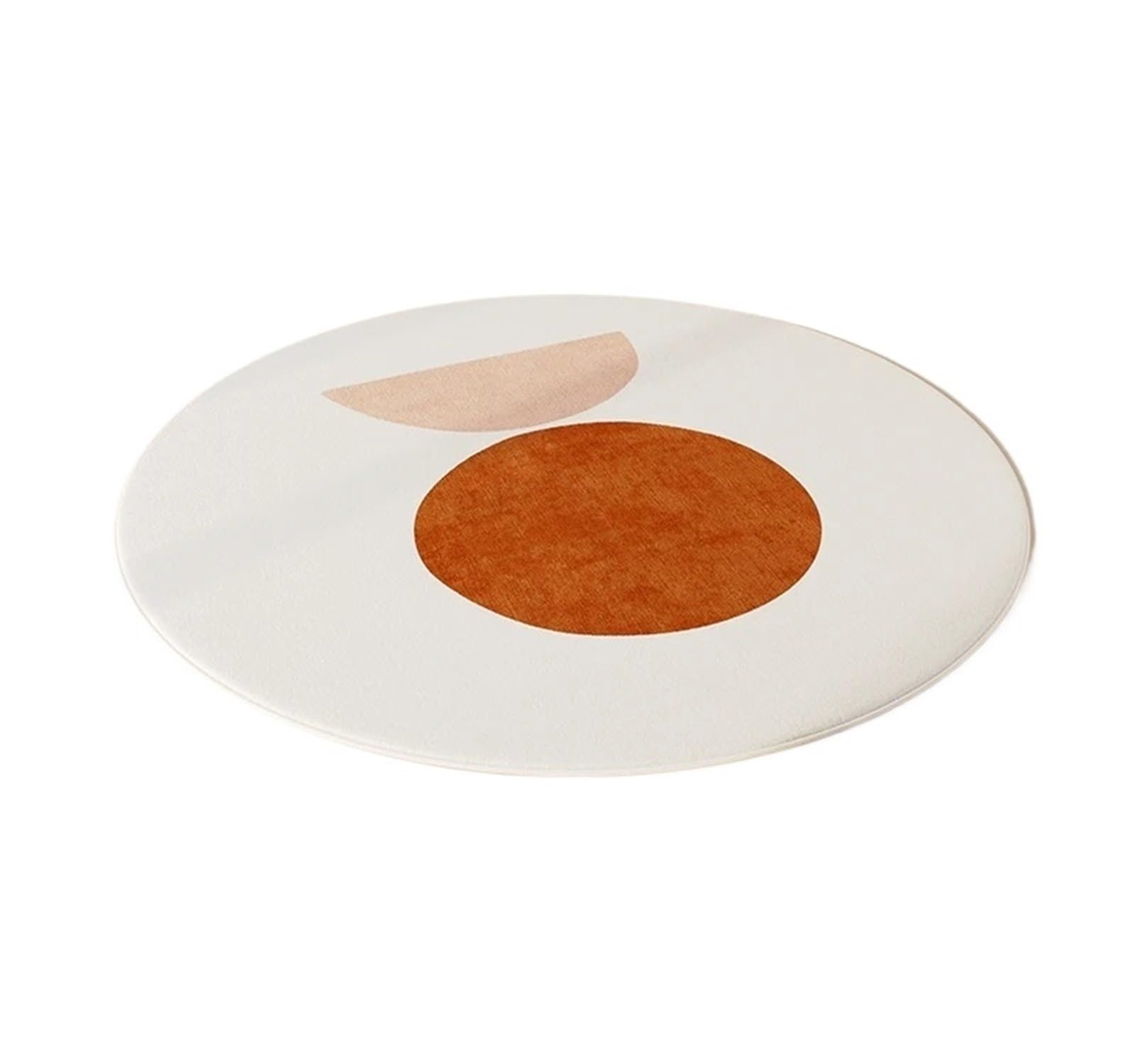 Tapis rond en peluche au pied du canapé pour créer un salon chaleureux