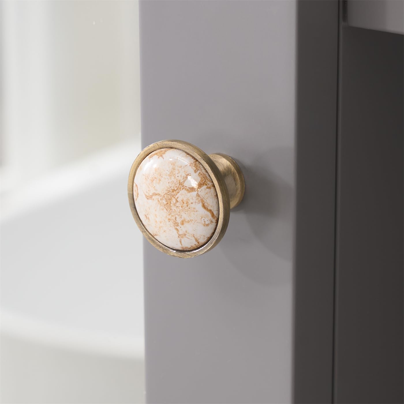 Close-up of the decorative knob on the WELLFOR medicine cabinet