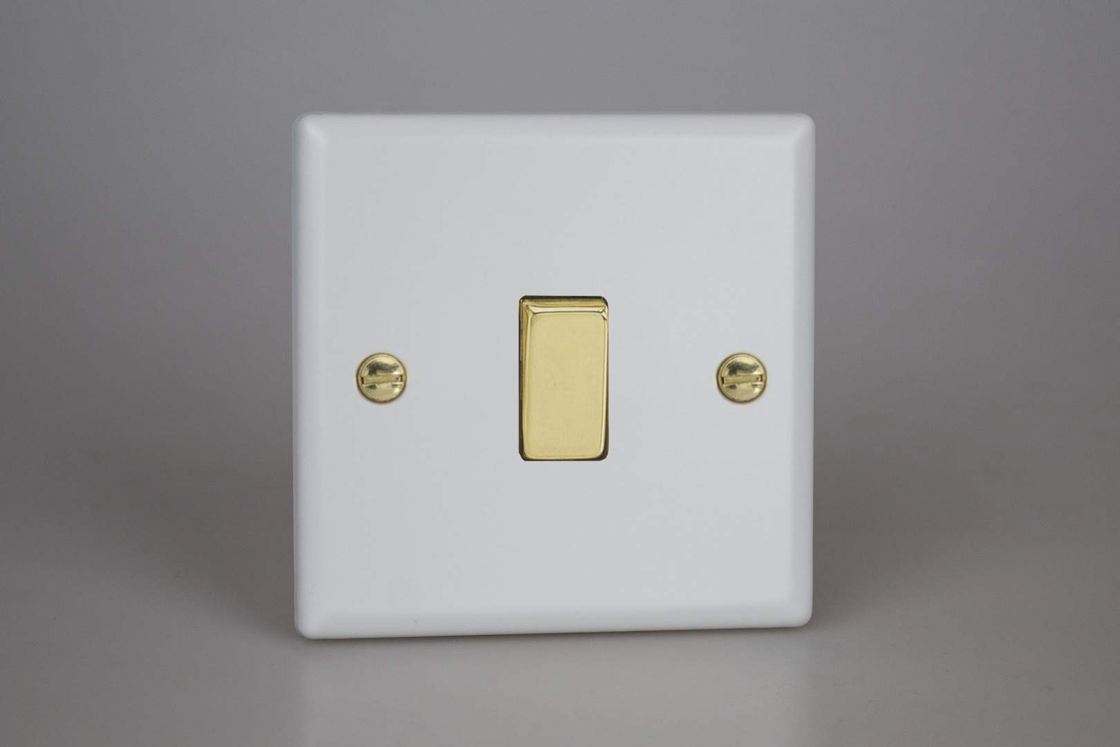 Varilight Single Rocker Light Switch 2-WayVogue Matt White With Polished Brass RockerXy1V.mw from B&Q