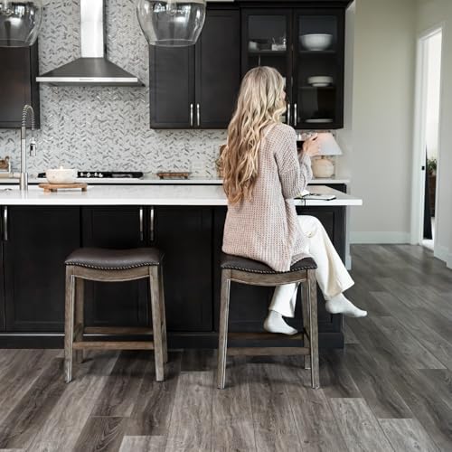 Image of Maven Lane Adrien Backless Counter Stool - Set of 3 - 26 Inches - Saddle Stool with Footrest - Brown Solid Wood Frame & Dark Brown Faux Leather Upholstery - Perfect for Kitchen Islands & Counters
