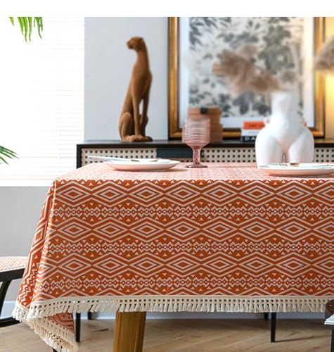 Nappe à motif totem géométrique orange en polyester avec pompons élégants