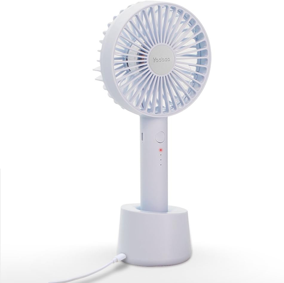 Yoobao Portable USB Handheld Fan F02-BE in its charging dock