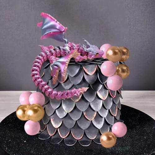 Décoration gâteau dragon et boules roses pour anniversaire