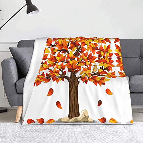 Couverture polaire citrouilles contre le froid en canapé