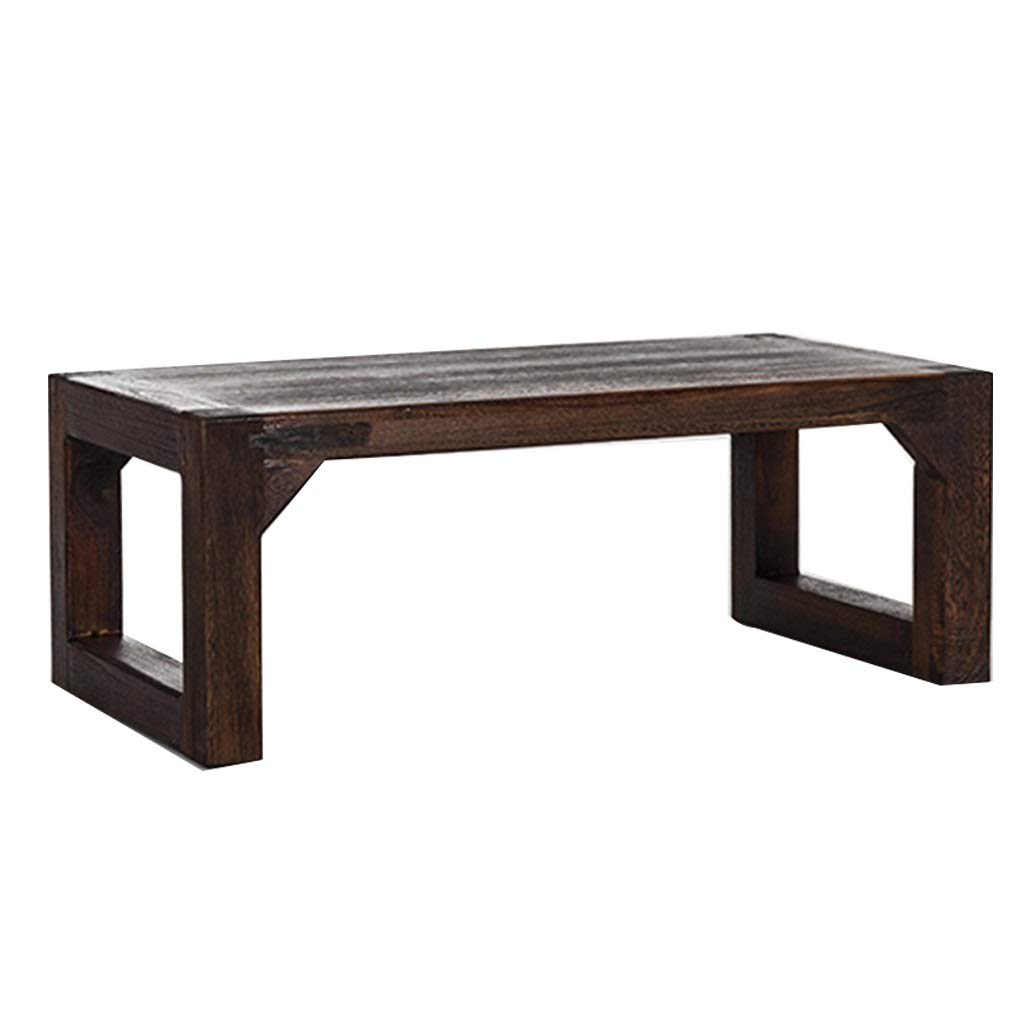 Table basse en bois massif pour un petit-déjeuner serein sur le balcon