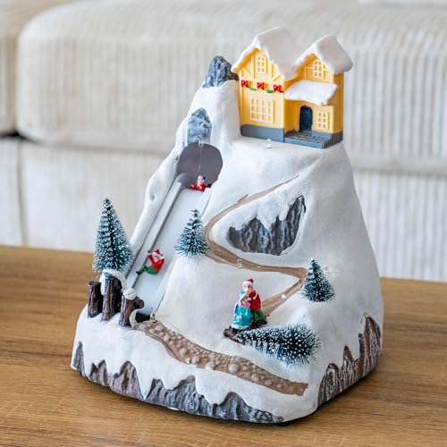 IlGruppone Giostra Natalizia con Scivolo e Casa Illuminata Villaggio di Natale con Luci LED, Movimento e Musica Decorazione Natalizia da Tavolo Funzionamento a Batterie (3xAA) 21 cm